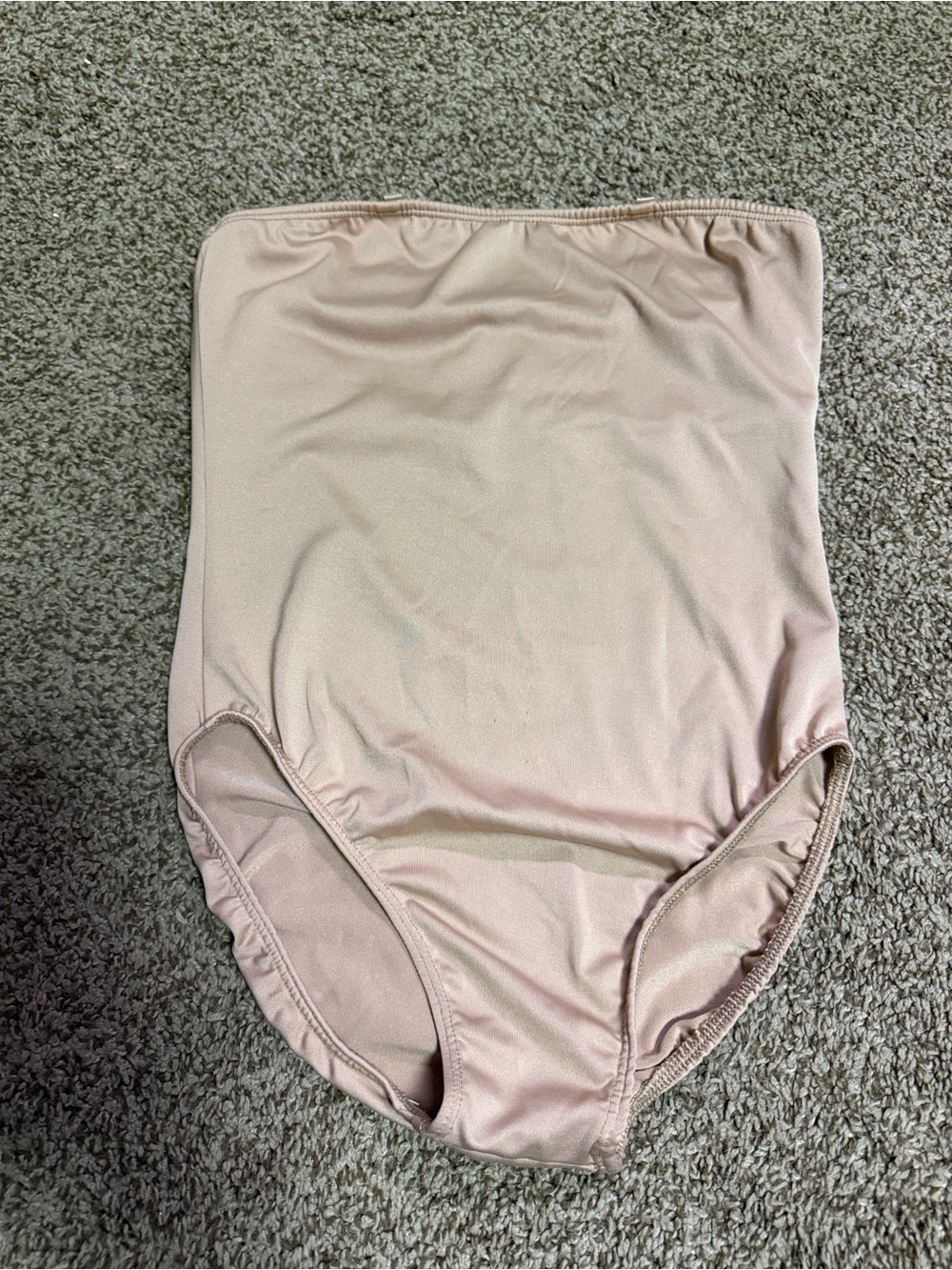 One piece strapless leotard in nude color. Size small